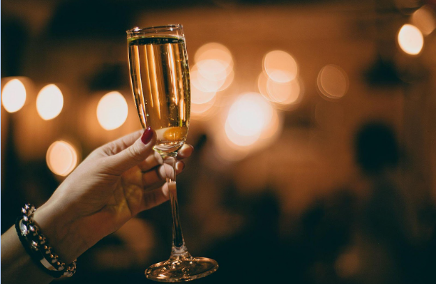 How Does Champagne Sparkle in Slow-Motion Toasts?